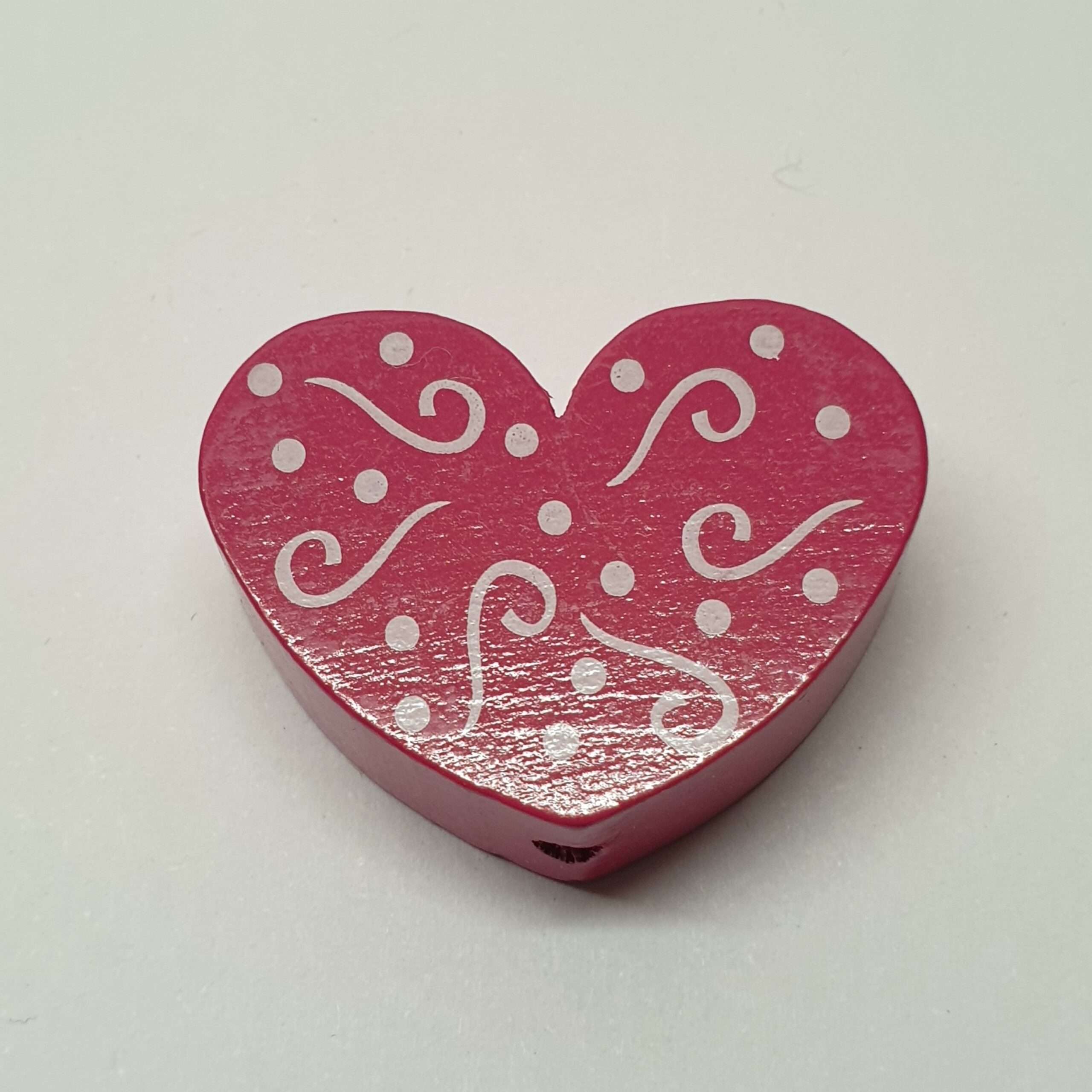 Motivperle Motiv Herz Herzchen Herz´l dunkelrosa himbeerfarben Schnörkel weiß MP210